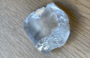 A natural diamond is a gemstone composed of crystallized carbon