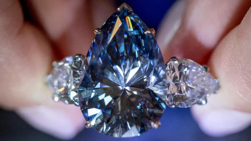 The 17.61 carat, pear-shaped Bleu Royal diamond, set in a ring, fetched $43.8 million