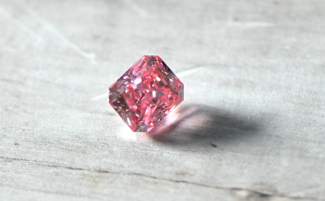 A leading auction house was shocked to discover a pink diamond it planned to sell was actually a fake.