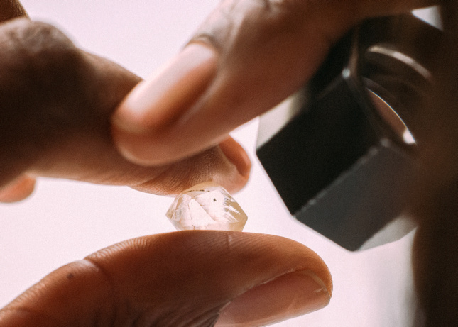 The global diamond industry is facing its most severe downturn in decades, with De Beers posting a staggering $511 million EBITDA loss for 2025