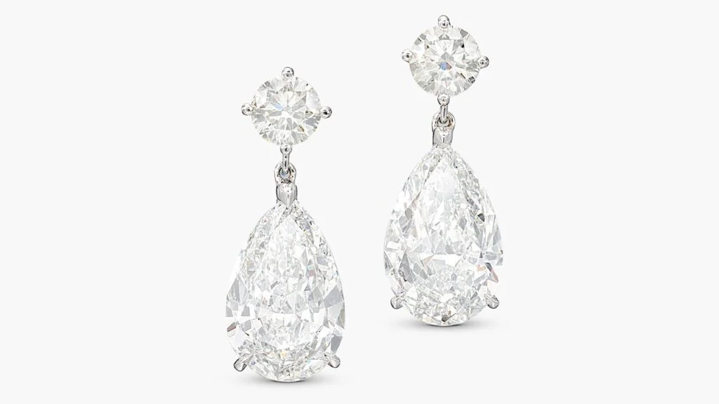 pear-shaped, E-color, VVS2-clarity diamonds — of 3.10 and 3.16-carats
