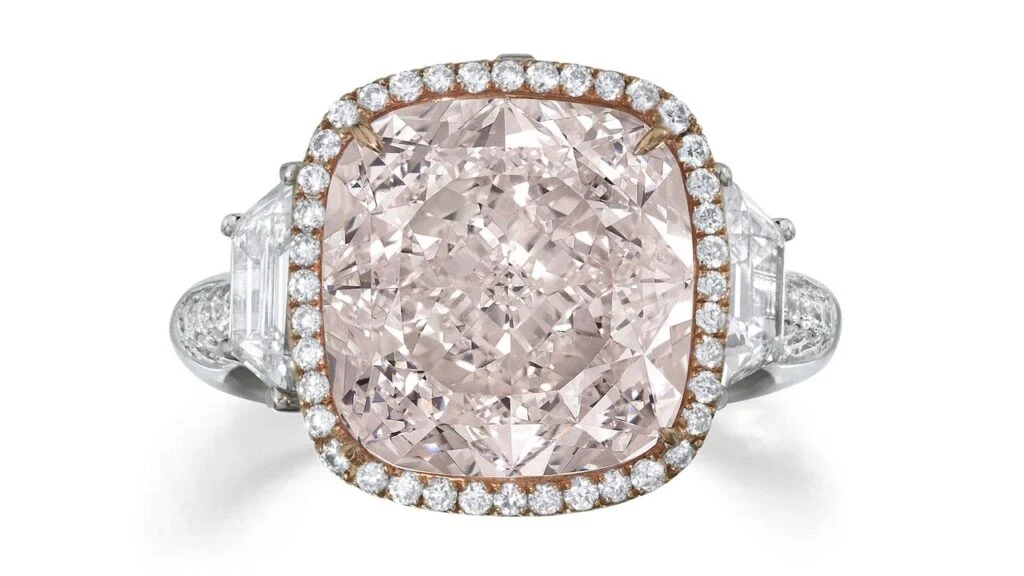 This ring features a cushion-cut, 8.23-carat, faint-pink, internally flawless diamond